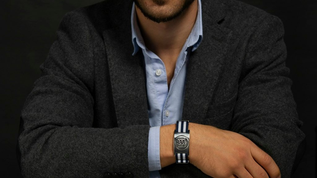 Man wearing a business casual outfit with a blazer and shirt
